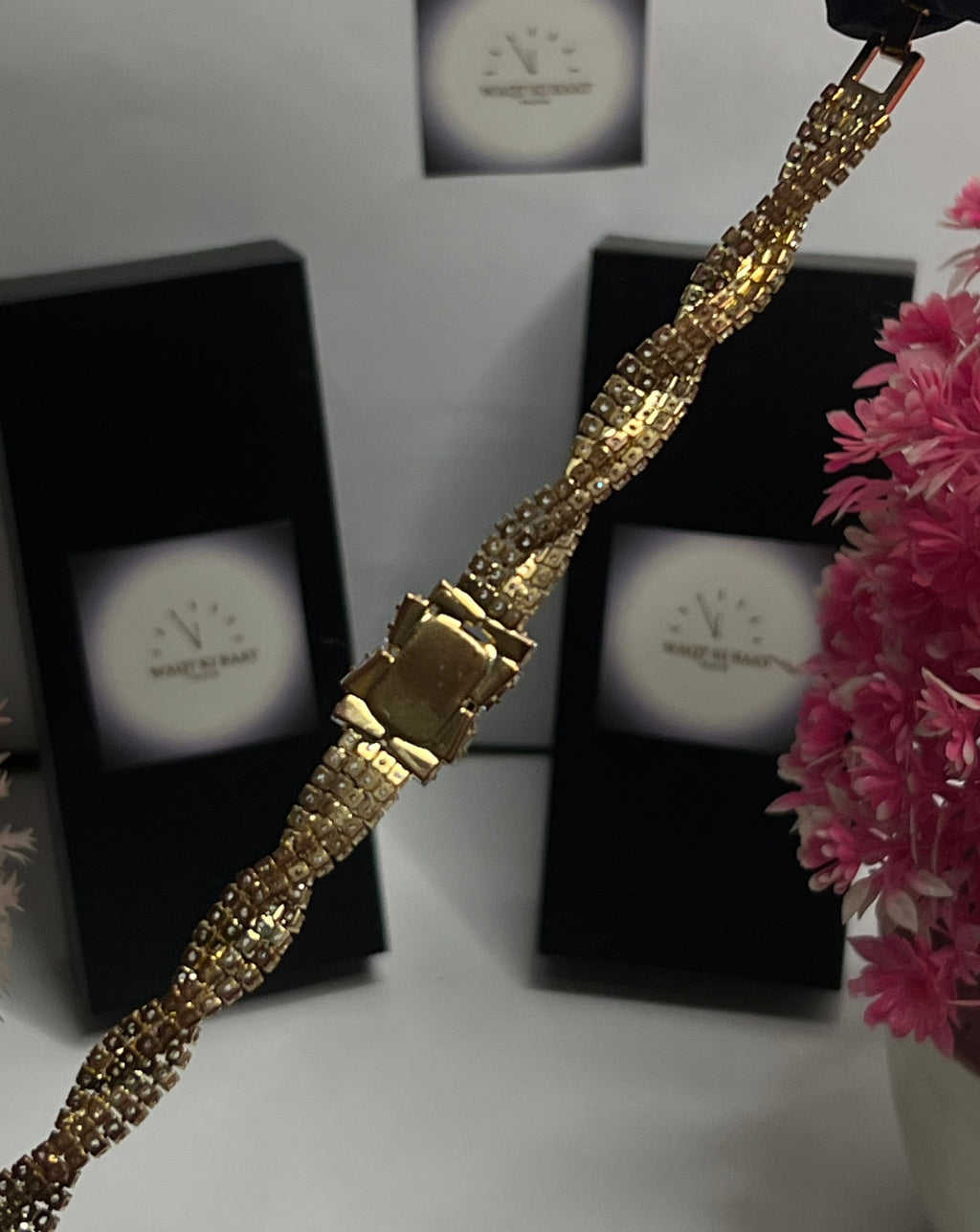 Luxury Gold Crystal Twist Bracelet with Black Emerald-Cut Center Stone