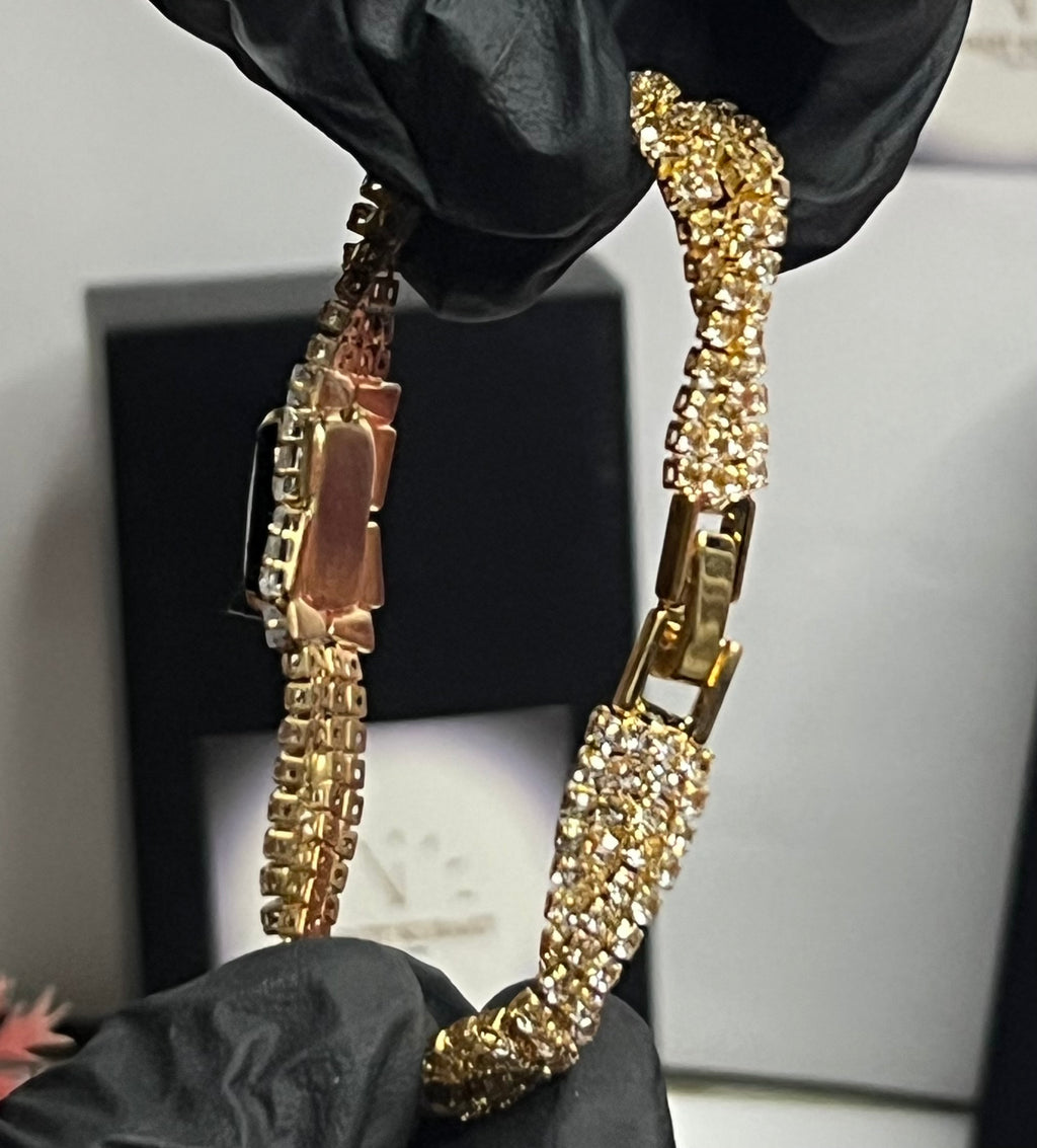 Luxury Gold Crystal Twist Bracelet with Black Emerald-Cut Center Stone