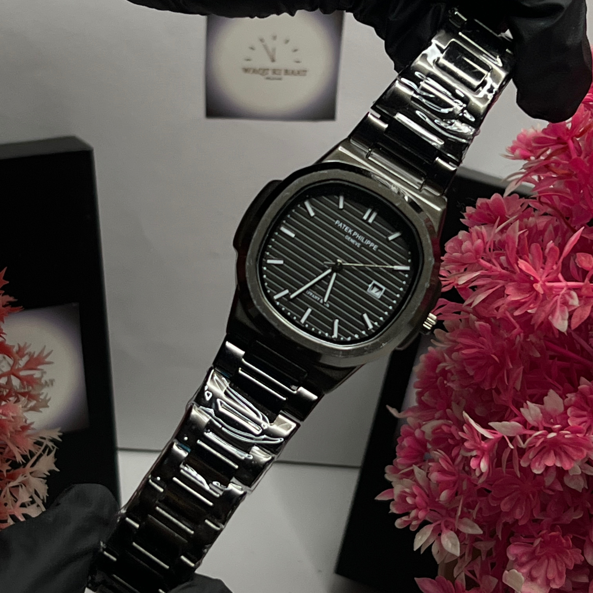 Patek Philippe Luxury Steel Watch with Black Textured Dial – Classic Date Edition