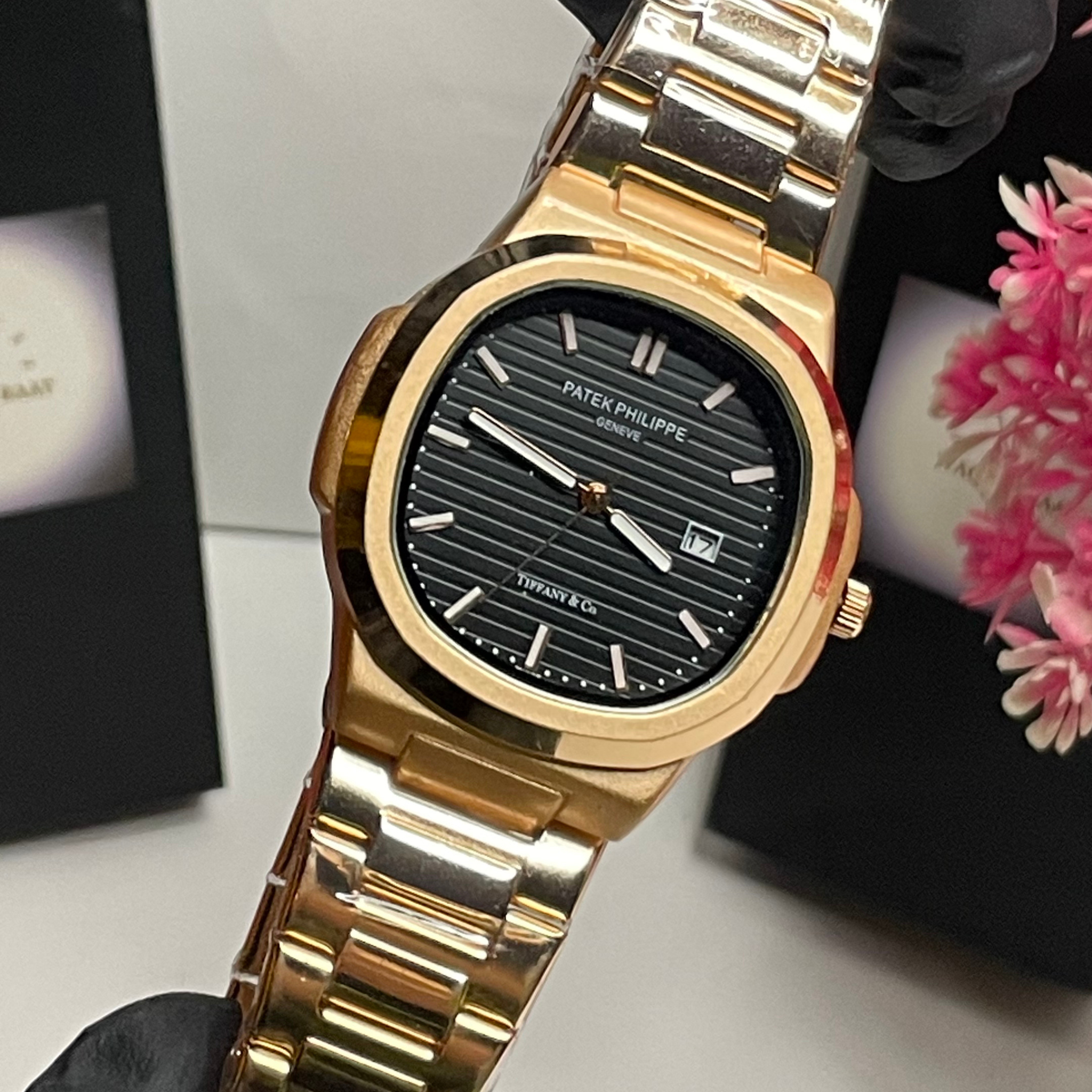 Patek Philippe Luxury Steel Watch with Black Textured Dial – Classic Date Display